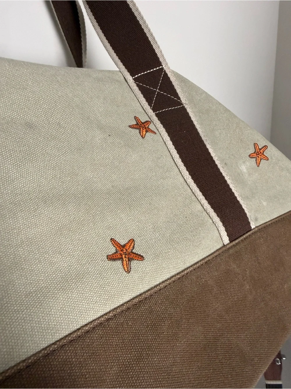 L.L. Bean Cream Canvas Duffel with Brown Straps and Orange Star Accents